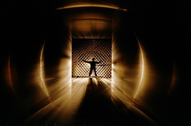 An image of a wind tunnel worker testing air flow 