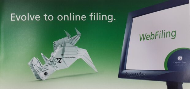 Picture of an ad for WebFiling showing a paper dinosaur next to a computer