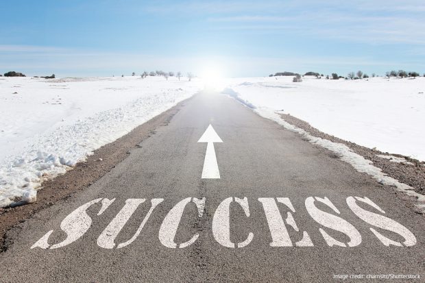 Picture of a road with success written on it