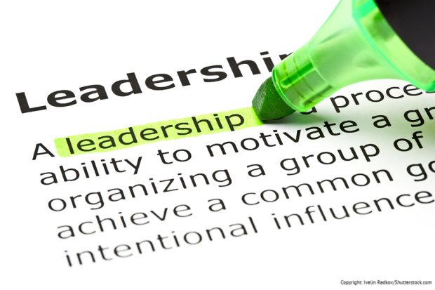 A green highlighter pen highlighting the word 'leadership'