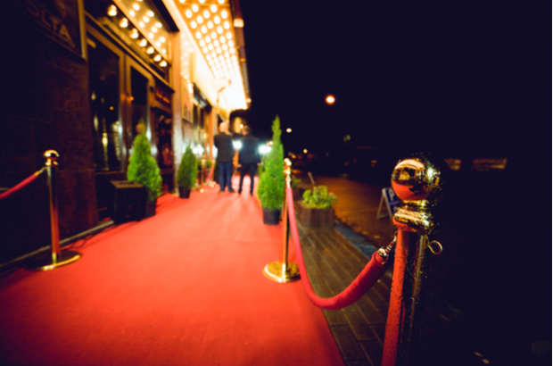 The red carpet outside a venue. 