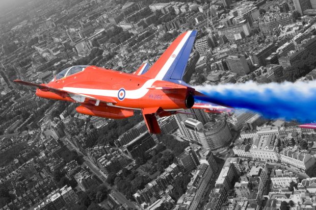 A Hawk T1A from the Red Arrows roars over London during a flypast for the Queen's 80th Birthday in 2006.