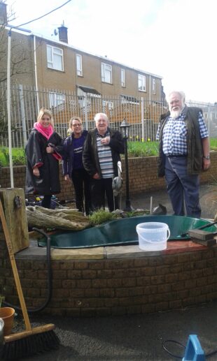 Clearing the pond at Linden Court.