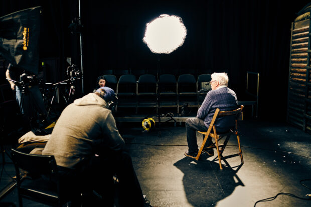 Director of the Bear Pit Theatre under the spotlight being interviewed and filmed by Companies House team.