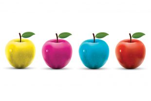 Four apples in the colours of the Sgt Pepper's outfits lined up horizontally against a white background.