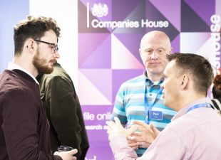 Companies House colleagues giving advice to attendees at our digital open day.