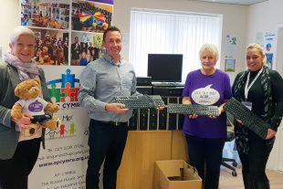 Companies House colleagues donating computers to AP Cymru.