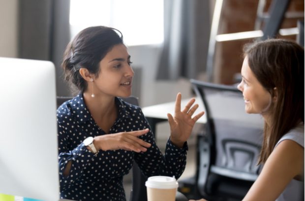 A female colleague offering business advice.