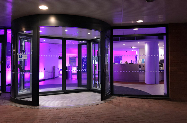 The entrance of Companies House, Cardiff lit up purple in support of #PurpleLightUp