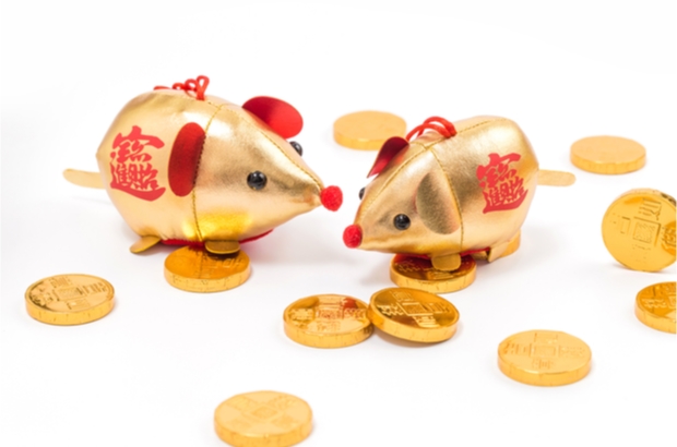 Gold coins around gold rat ornaments