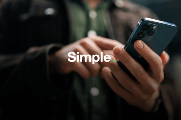 A person is typing on a smartphone with the word 'simple' overlaid